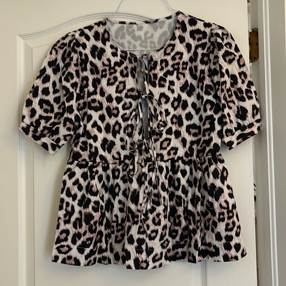 Peplum leopard blouse never worn